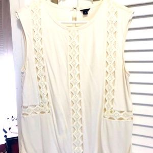 Cream colored Ann Taylor blouse with cut outs